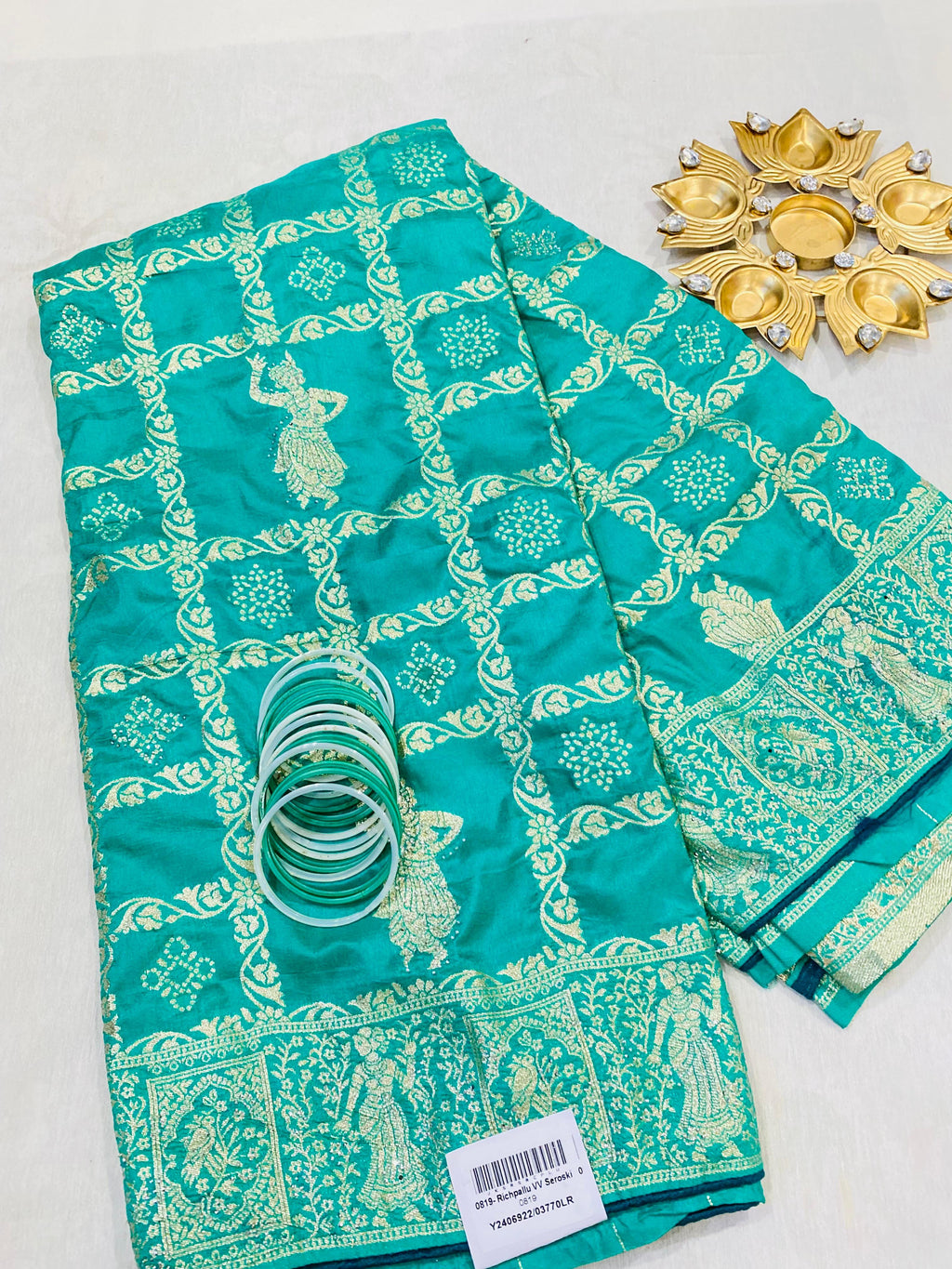 Elegant Teal Jaipur Saree with Golden Dancing Motifs