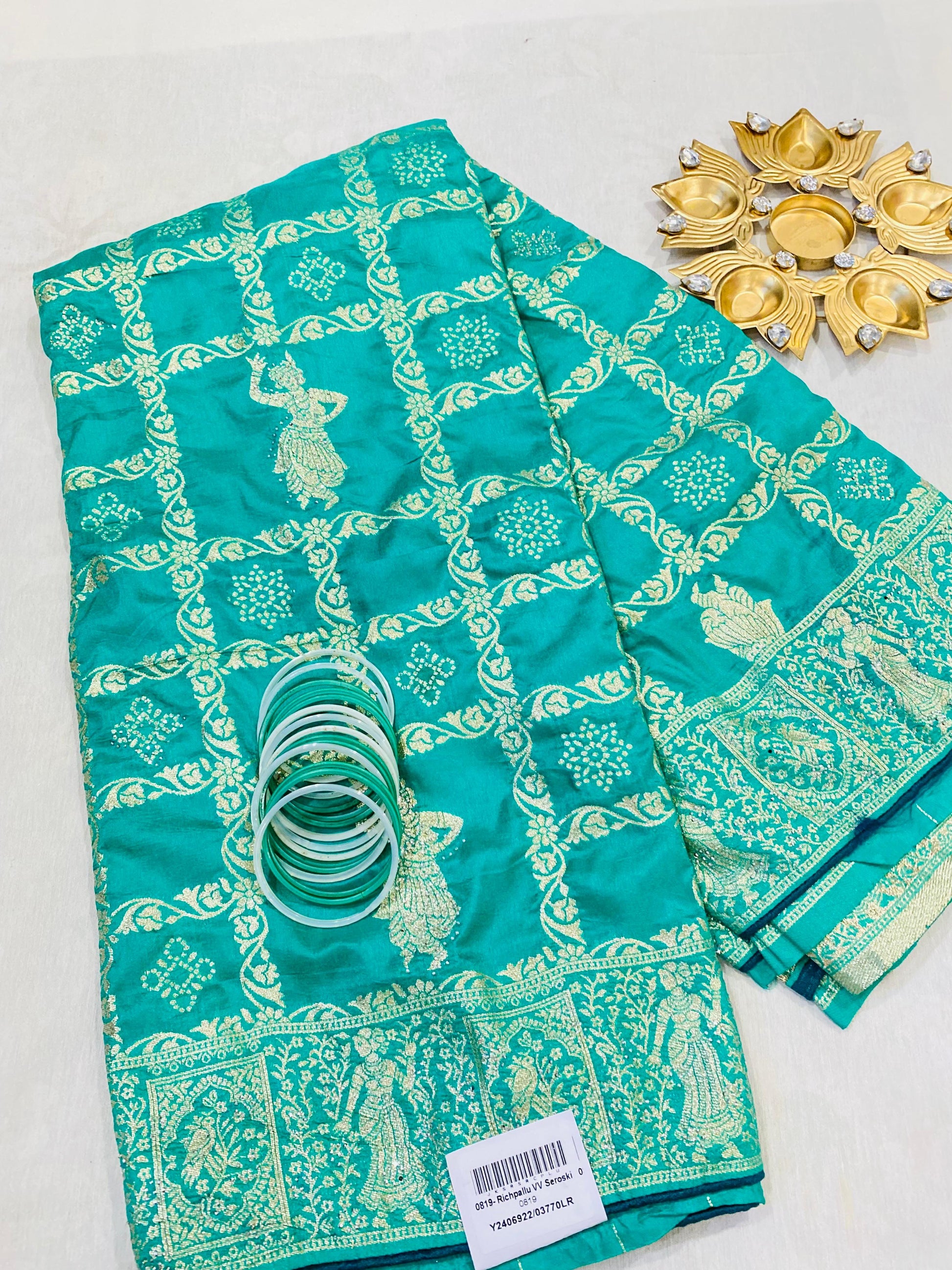 Elegant Teal Jaipur Saree with Golden Dancing Motifs