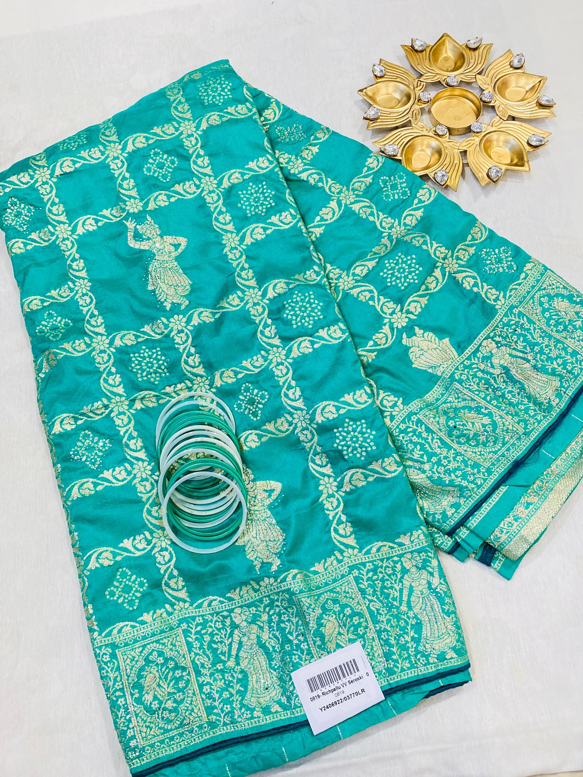 Elegant Teal Jaipur Saree with Golden Dancing Motifs
