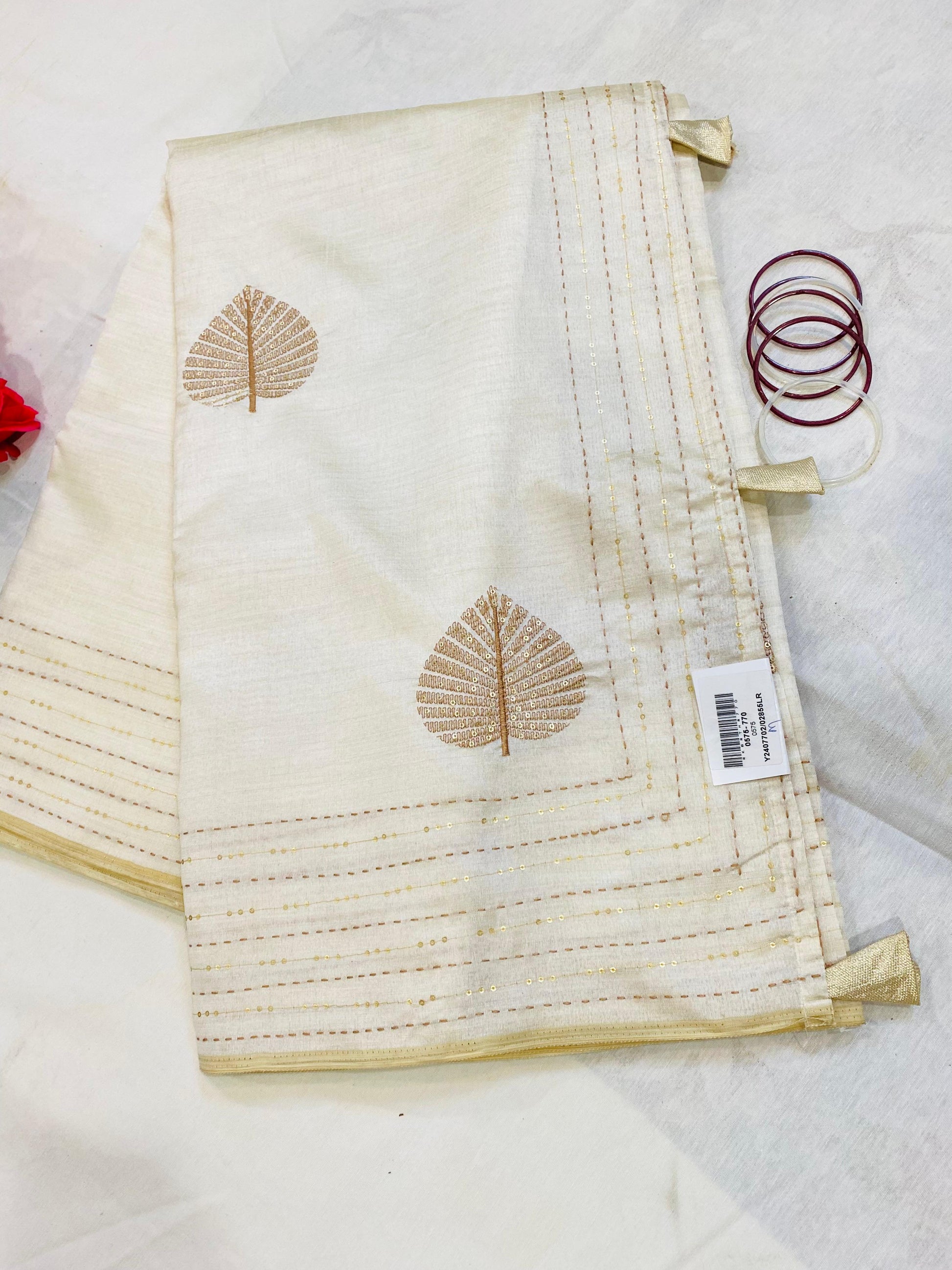 Elegant Off-White Jaipur Saree with Golden Leaf Motifs